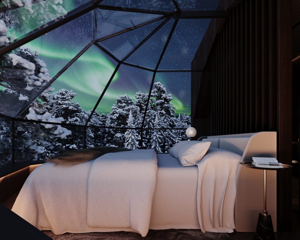 Northern Lights view from a glass roof igloo bedroom in Lapland
